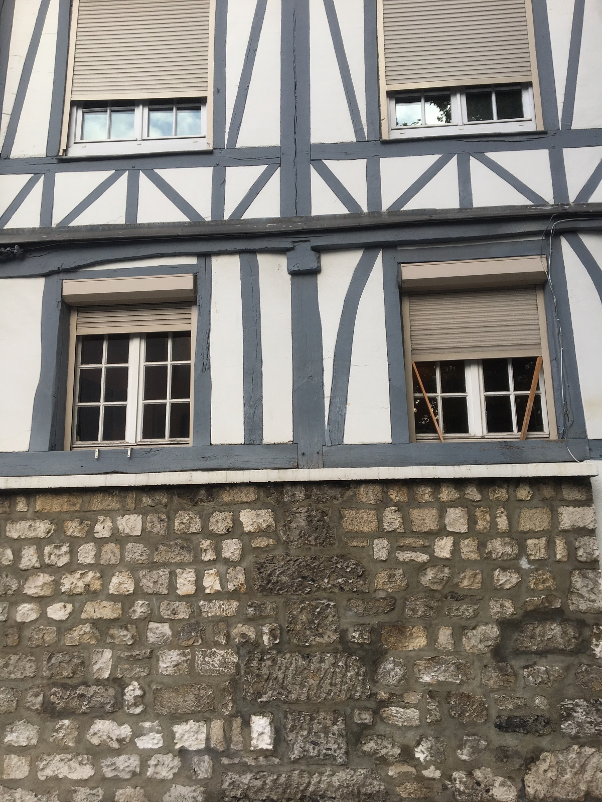 Remplacement de fenêtres en bois sur immeuble ancien